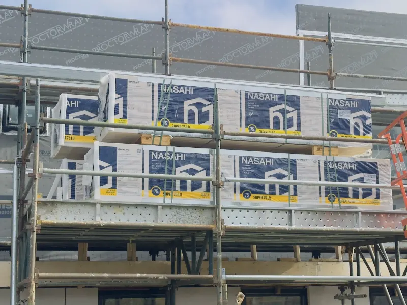 Hebel panels lifted onto scaffold, ready for installation